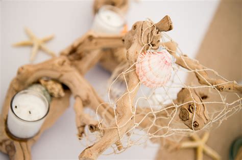 Driftwood and Seashell Centerpieces | Seashell centerpieces, Rustic ...