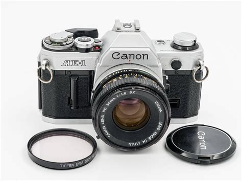 CANON AE-1 Film SLR Camera with choice of two Lenses