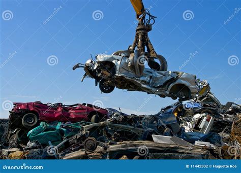 Junkyard Picking Up Car Stock Photography - Image: 11442302