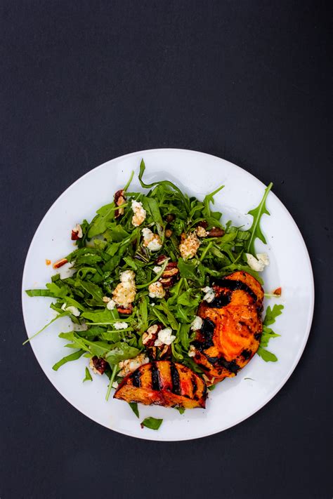 Arugula Salad with Grilled Nectarines, Blue Cheese and Toasted Pecans - NOURISH Evolution