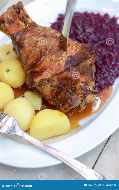 German Eisbein with Braised Cabbage(Sauerkraut),salad and Beer,roasted Pork Knuckle.call ...