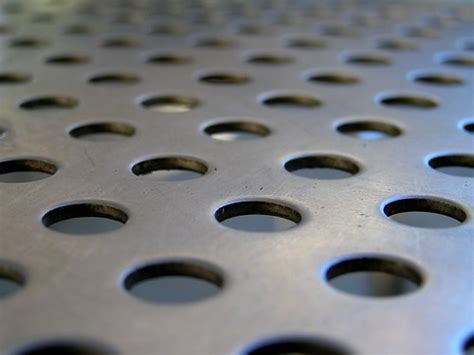 All in all, just another hole in the table | Polished metal … | Flickr