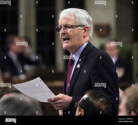 Transport Minister Marc Garneau stands during Question Period in the House of Commons in Ottawa ...