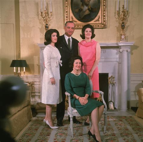 Lady Bird Johnson: President Lyndon B. Johnson takes a family photo in the White House with the ...