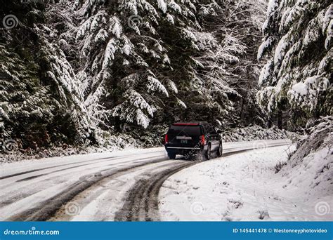 SUV Driving in the Snowy Mountains Stock Photo - Image of vehicle ...