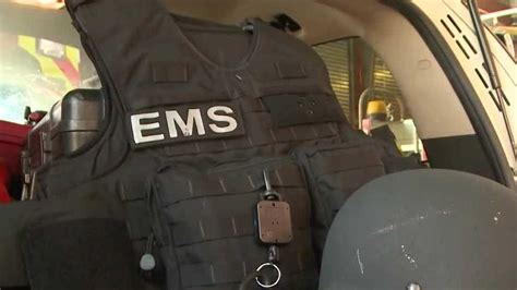 Albuquerque firefighters equipped with bulletproof vests