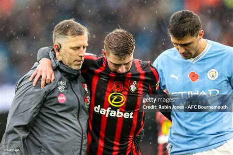 Alex Scott of Bournemouth, with Rodri of Manchester City, Scott goes ...