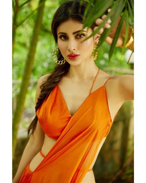 Mouni Roy Looks Alluring in Orange Saree | Telugu Rajyam Photos