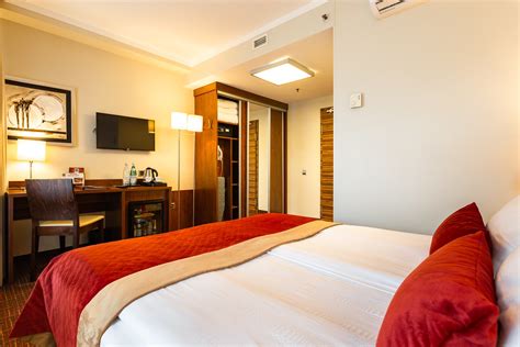 Rooms & Suites - AVALON HOTEL & Conferences