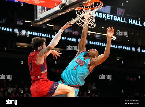 San Diego State guard Lamont Butler (5) shoots over St. Mary's guard ...