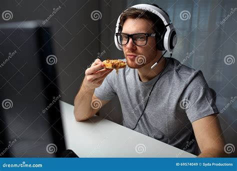 Man in Headset Playing Computer Video Game at Home Stock Image - Image of home, internet: 69574049