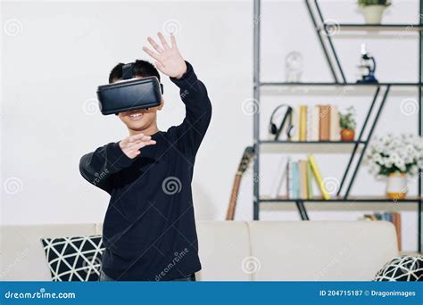 Boy Playing Game in VR Glasses Stock Image - Image of science, augmented: 204715187