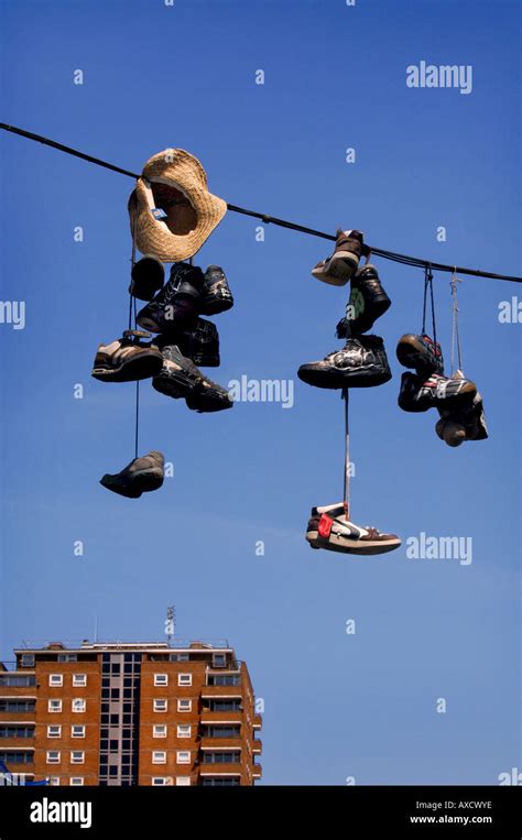 Shoes hanging from power lines in the North Laine district of Stock Photo: 9602941 - Alamy