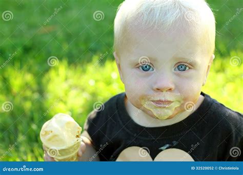 Messy Baby Eating Ice Cream Cone Stock Photo - Image of hair, summer ...