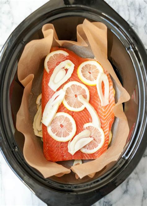 Layering fish into the slow cooker Crock Pot Food, Crock Pot Slow Cooker, Slow Cooker Recipes ...