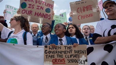 Protesting Climate Change, Young People Take to Streets in a Global Strike - The New York Times