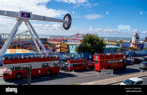 Open top tourist buses outside Adventure Island amusement park, showing ...