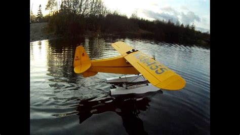 Rc Piper Cub testing new floats.wmv - YouTube