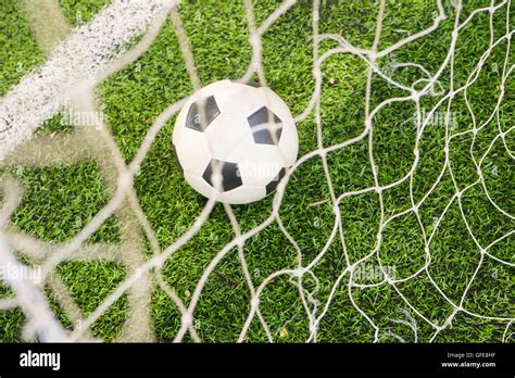 soccer ball in goal Stock Photo - Alamy