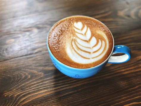 Morning Coffee Cup,latte Art Coffee Cup On The Wooden Table Stock Photo ...