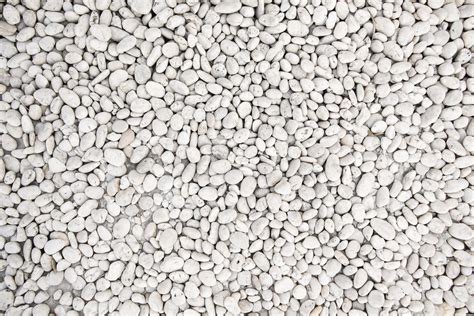 White pebble stones texture on the ground 2094848 Stock Photo at Vecteezy