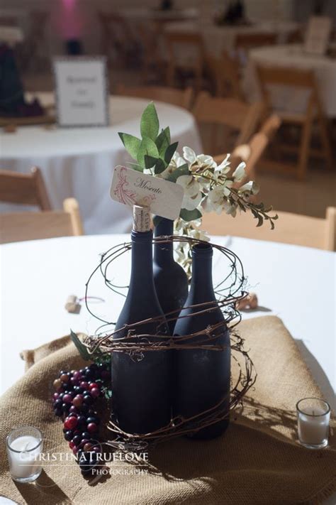 53 Vineyard Wedding Centerpieces To Get Inspired | Wine theme wedding, Wine bottle centerpieces ...