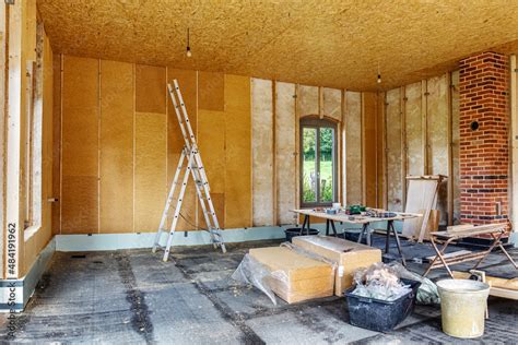 Installing thermal insulation inside a building, wood fiber boards Stock Photo | Adobe Stock