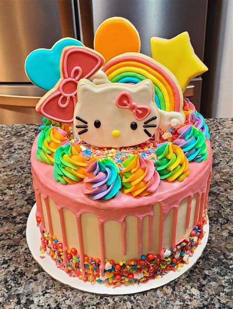 Hello kitty rainbow cake | Hello kitty birthday cake, Hello kitty cake ...