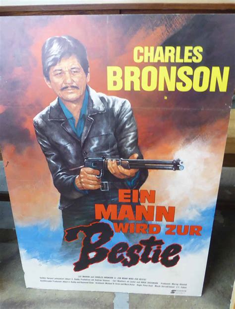 FOUR CHARLES BRONSON FILM POSTERS, 104cm H x 68cm and 84cm H x 59cm. (4)