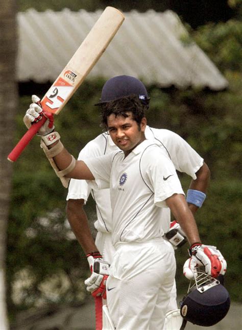 Parthiv Patel acknowledges the cheers after reaching his century | ESPNcricinfo.com