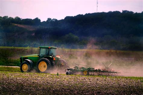 John Deere Plowing the Field Photograph by Kim Blaylock