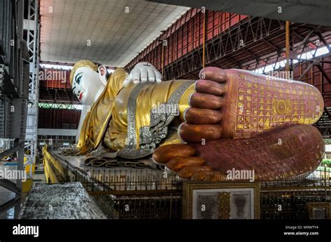 The reclining Buddha in Chaukhtatgyi Buddha Temple in Yangon Stock Photo - Alamy