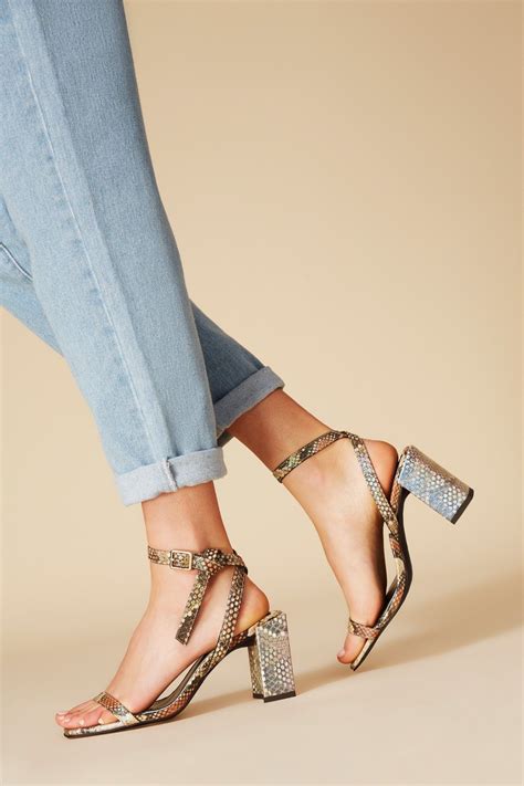 ESSENTIAL SNAKE HEEL | Heels, Snake heels, Fashion shoes