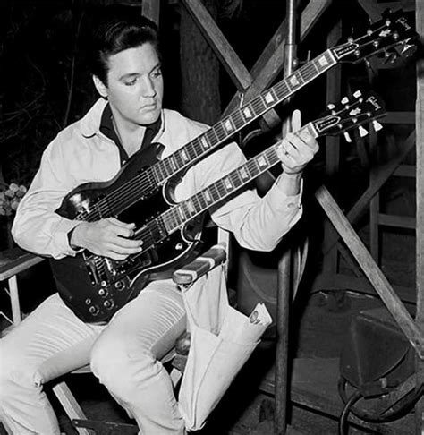 Elvis Presley playing a double-neck Gibson guitar. #Elvis #ElvisPresley #Gibson | Elvis presley ...