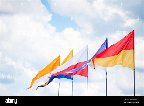 triangular flags in wind Stock Photo - Alamy