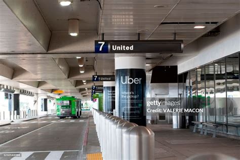 A shuttle drives through empty Terminal 7 at Los Angeles... News Photo ...