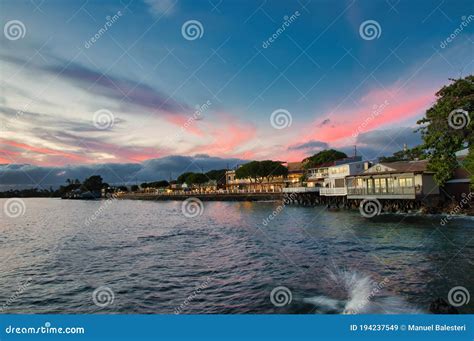 Lahaina Harbor at Sunset with View of the Ocean Side of Front Street Shops. Stock Image - Image ...