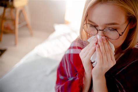 Premium Photo | Blond woman having cold and blocked nose. helth care and allergy treatment ...