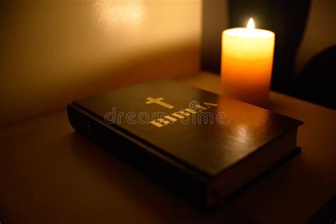 Candle light Bible stock photo. Image of colours, table - 56520160