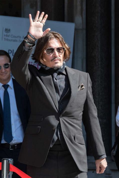 Johnny Depp in a Gray Suit Arrives at the Royal Courts of Justice in ...