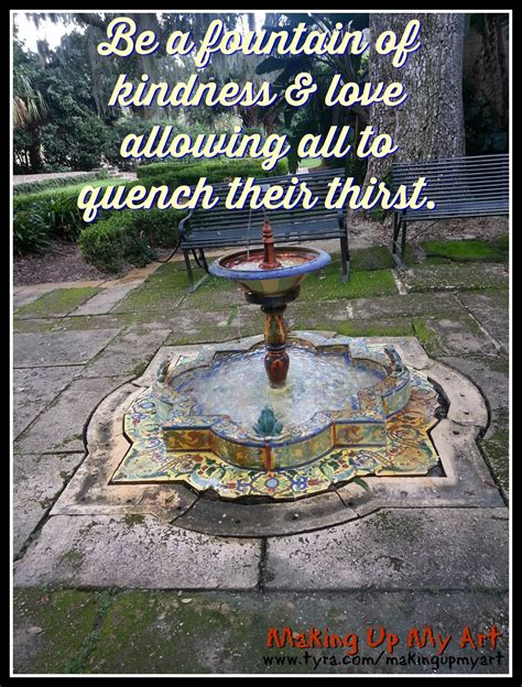 a fountain with a quote on it sitting in the middle of a park next to a ...