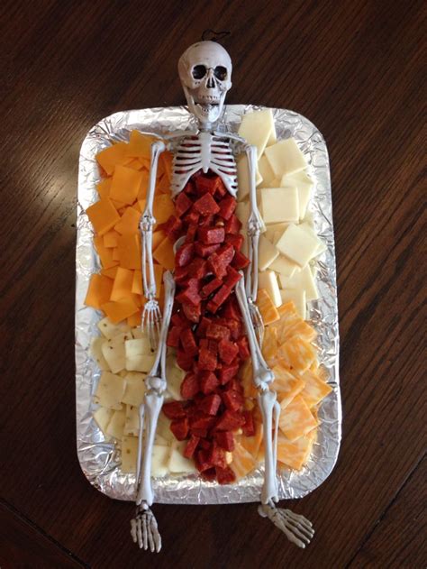 Skeleton Meat & Cheese Platter | Halloween food for party, Halloween party kids, Spooky ...