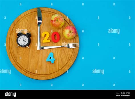 Intermittent fasting concept. 20:4 fasting diet concept. Top view. Flat lay Stock Photo - Alamy