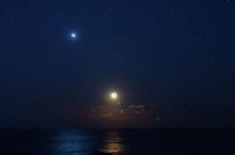 Moonrise Above Horizon And Venus by Noriakimasumoto