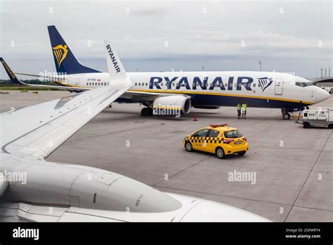 Ryanair Airlines Airbus A320 seen on the landing area with a safety car ...