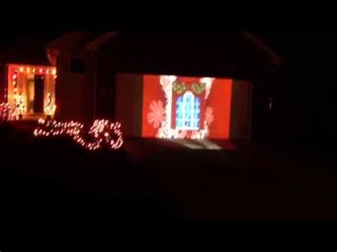 Christmas projector greetings garage door! - YouTube