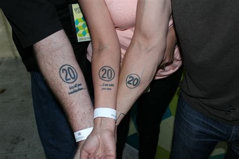 Absolutely still in awe that we got a pic of our tattoos with Rob ...