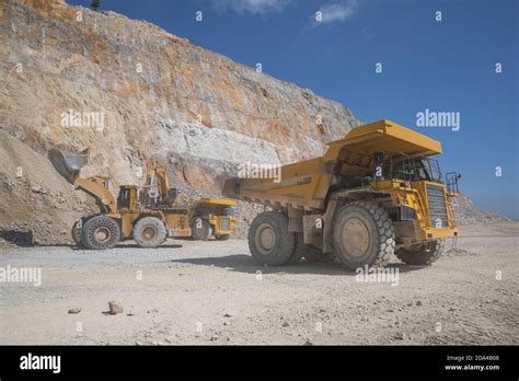 Mining equipment working in open pit Stock Photo - Alamy