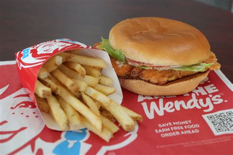 French Fries and Crispy Chicken Sandwich at Wendy S Restaurant. Editorial Photography - Image of ...