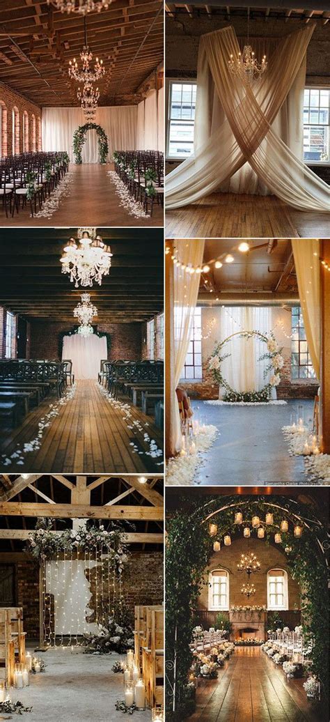 the inside of a wedding venue with chandeliers and flowers